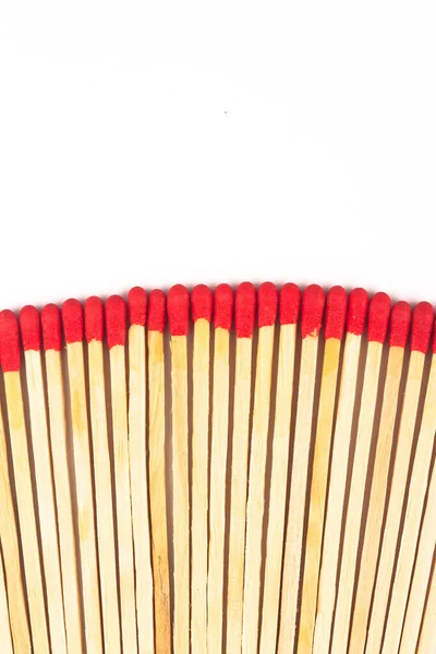 Front view macro closeup of long red wooden match sticks isolated on white background — Stock Image Front View Macro Closeup Long Red Wooden Match Sticks Isolated Stock Picture