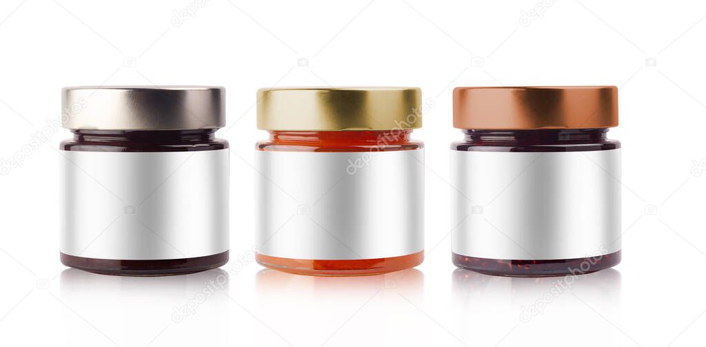front view of set of small jam jars in different colors with empty labels and shiny metallic lid covers isolated on white background