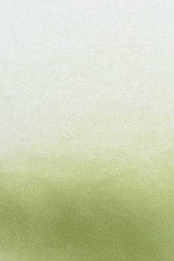 Beyaz bir arka planda sprey boya yeşile boyanmış 