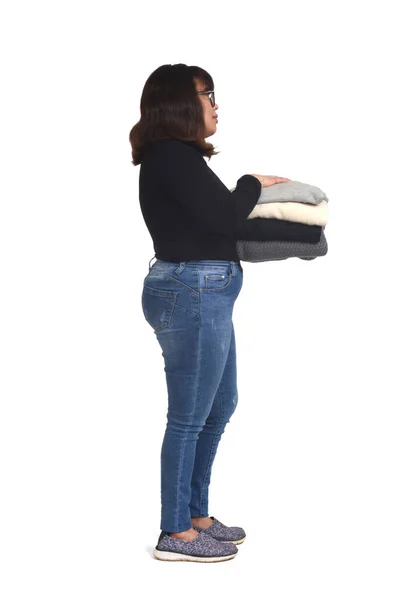 Side View Latin Woman Holding Pile Clean Clothes White Background — Stock Photo, Image