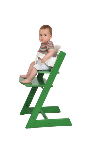 Side View Baby Sitting Highchair Looking Camera Isolated White Background — Stock Photo, Image
