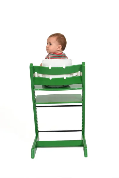 Visão Traseira Bebê Sentado Uma Cadeira Alta Isolada Fundo Branco — Fotografia de Stock