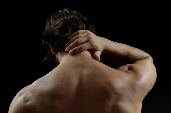 Hombre muscular con dolor de espalda — Foto de Stock