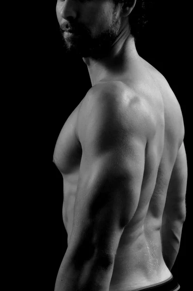 Studiio fotografía de un hombre con la espalda, blanco y negro — Foto de Stock