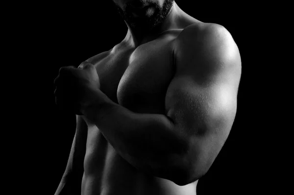 Om cu biceps cu fundal negru — Fotografie, imagine de stoc