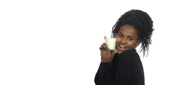 Teenage girl drinking milk — Stock Photo, Image