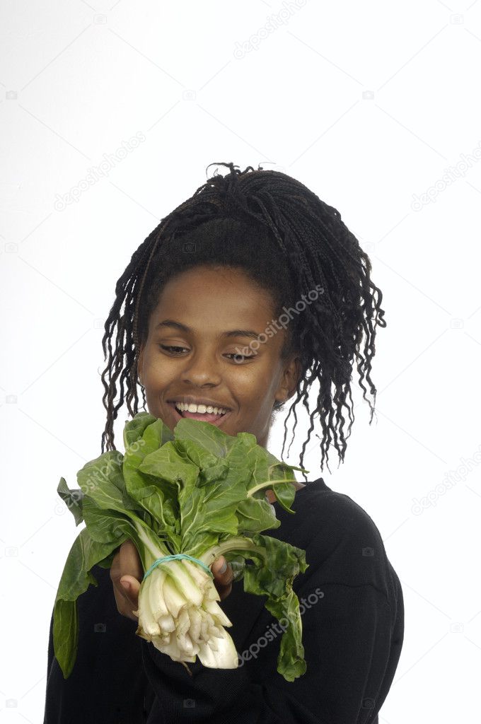 teenage girl with vegetables