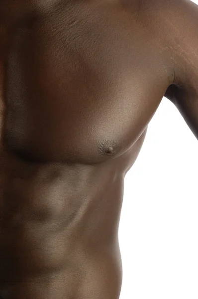 Lihaksikkaan mustan miehen rintalihakset, valkoinen selkäkilo — kuvapankkivalokuva