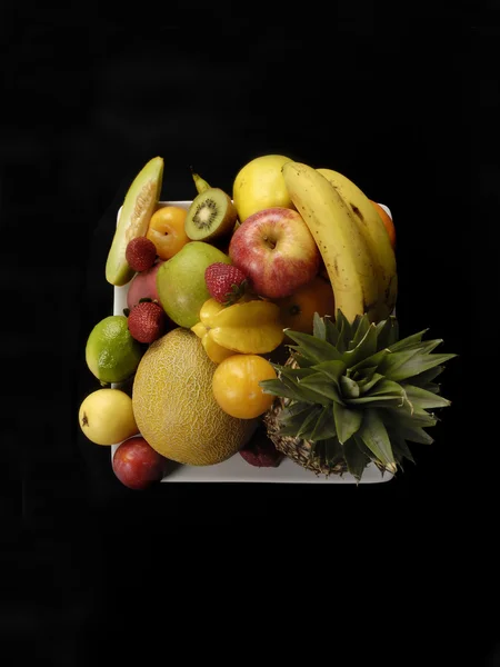 Detail of citurs  fruits on black background — Stock Photo, Image