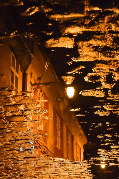 Rainy Night City Street Lamps Buildings Reflected Pond Rain — Stock Photo, Image