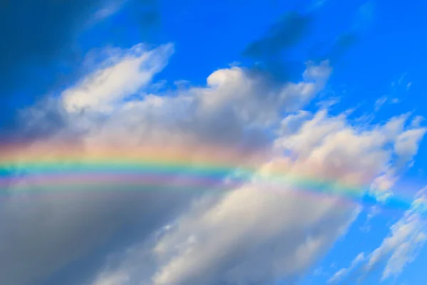 multicolored sun beam on a dark cloudy day