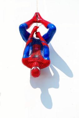 Ayuttaya, Thailand - December 30, 2014 : Spider-Man model upside clipart