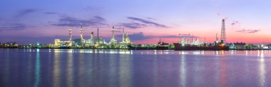 Tanker Oil refinery at twilight - Panorama picture clipart