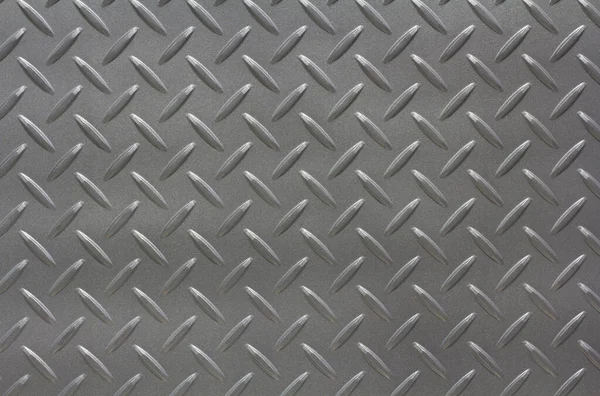 Gümüş boyalı metalik plaka kayma önleyici yüzey. Metal elmas plaka dokusu.