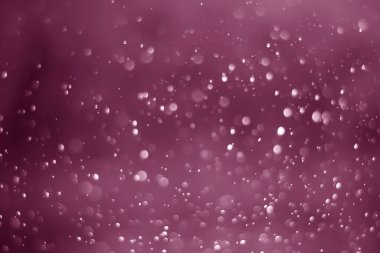 Pembe parıltılı klasik ışık arka planı. Pembe arka planda beyaz bokeh.