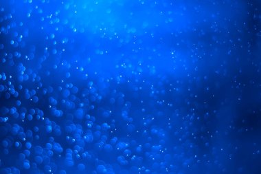 Mavi parıltılı klasik ışık arkaplanı.