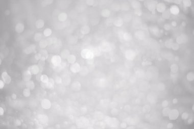 Beyaz parıltılı klasik ışık arka planı. Beyaz bokeh arkaplanı.