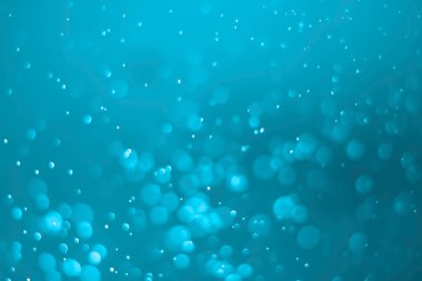 Mavi parıltılı klasik ışık arka planı. Sarı arkaplanda beyaz bokeh.