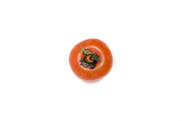 在白色背景上的橙色柿子。照片. — 图库照片