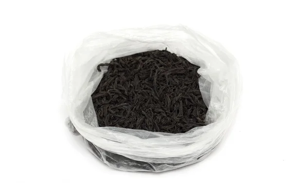 Teebeutel mit schwarzem Blatt. Foto. — Stockfoto