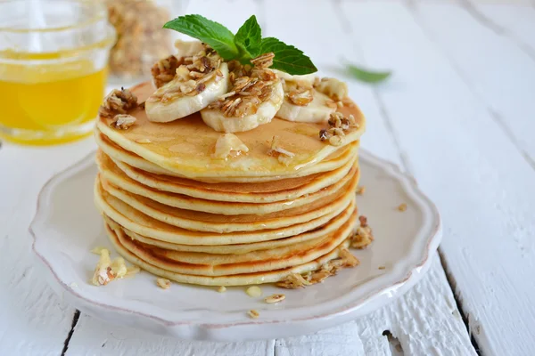 Pancake with banana, covered with honey or maple syrup with copy — Stock Photo, Image