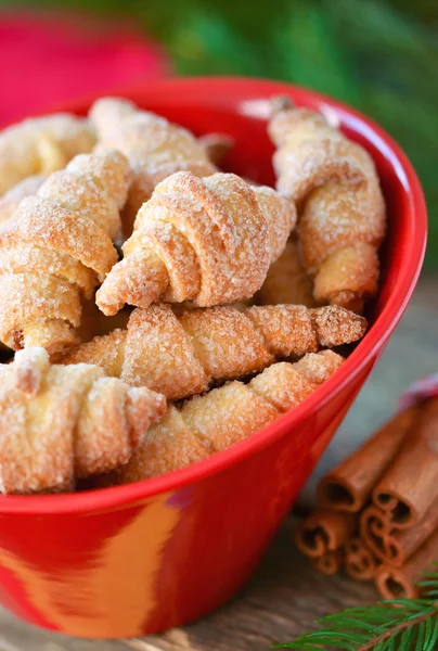 Christmas cookies with sugar, cinnamon and nuts on New Year's ta Royalty Free Stock Photos