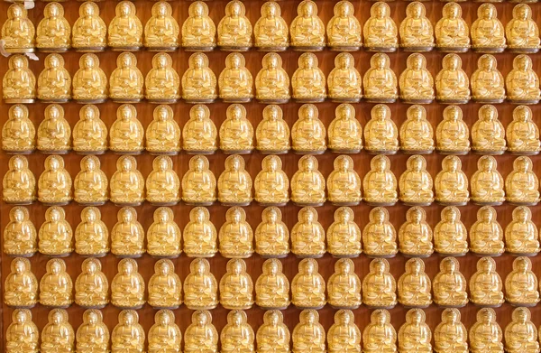 Buddha statues in lines at Chinese church in Thailand