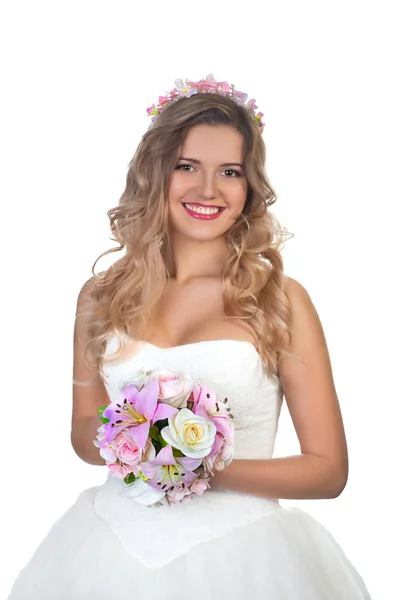 Bruden med en bukett blommor och i en smycken — Stockfoto