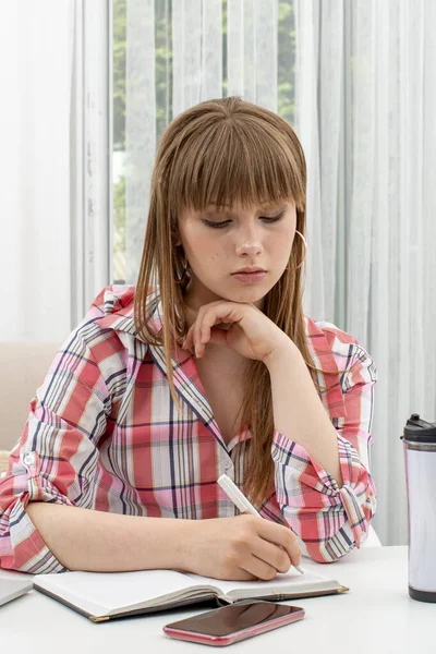 Teenage Schoolgirl Long Hair Bangs Sits Table Studying Handbooks Serious Stock Picture