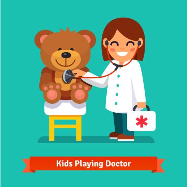 Small girl playing doctor