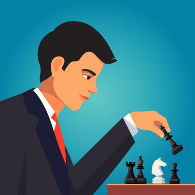 Confident businessman making chess move