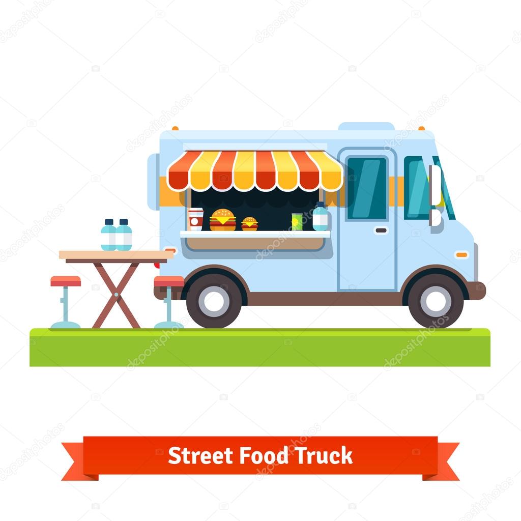 Opened street food truck with table