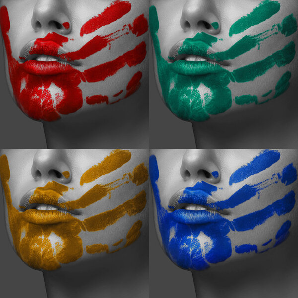 Красочные отпечатки рук на женском лице
