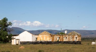 Abandoned and derelict farm school in the Karoo South AFr4ica showing the depopulation of the rural areas in South Africa clipart