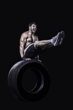 İzole bir lastik üzerinde Dengeleme sporcu