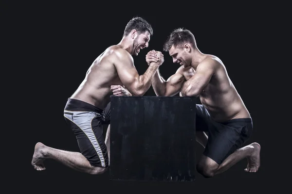 Két sportolók armwrestling — Stock Fotó