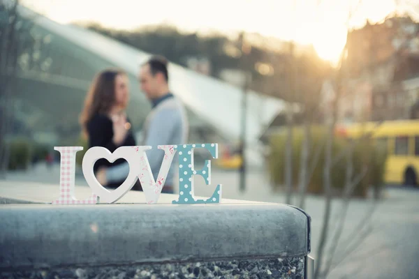 Wooden inscription Love — Stock Photo, Image