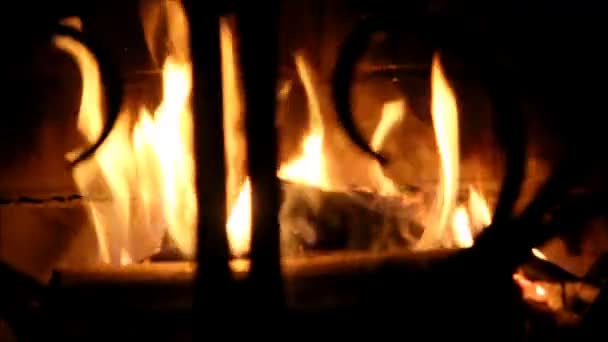 Fireplace in a dark room. — Stock Video