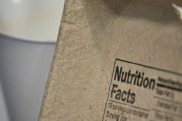 Egg carton lid with the words nutritional facts printed on the inside — Stock Photo, Image