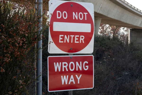 Wrong way do not enter sign on the side of the road — Stock Photo, Image