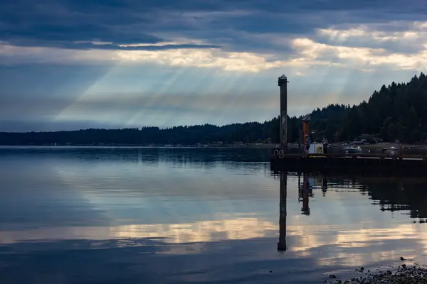 Light and sky and a fishing dock — Stock Photo, Image