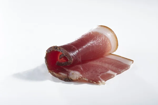 Pancetta su sfondo bianco — Foto Stock