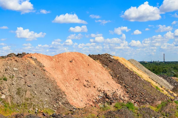 View of slag heaps of iron ore quarry. Mining industry