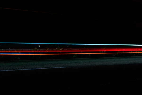 Trilhas Semáforo Uma Estrada Noite — Fotografia de Stock