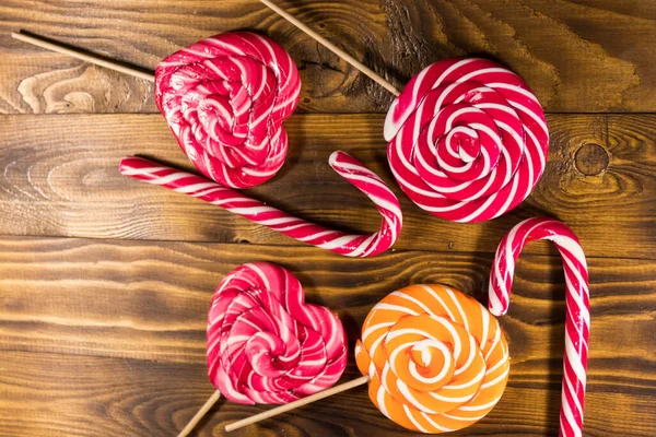 Sweet Lollipops Rustic Wooden Background Top View — Stock Photo, Image