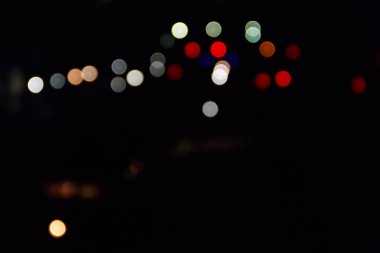 Bokeh efektli bulanık şehir ışıklarının soyut arkaplanı