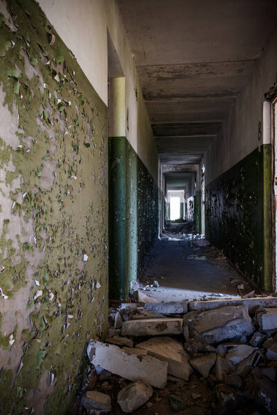 Long corridor of ruined abandoned house
