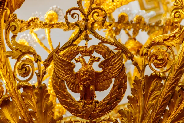 Golden double-headed eagle - the coat of arms of Russian Empire and Russian Federation