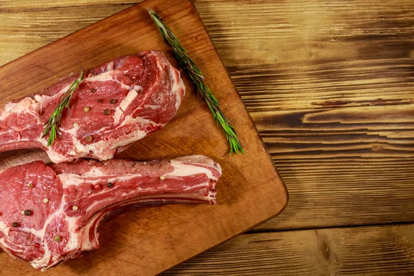 Raw Fresh Beef Rib Eye Steaks Bone Spices Rosemary Wooden — Stock Photo, Image