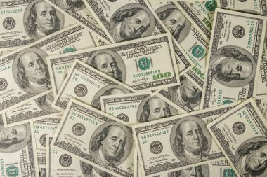 Yüz dolarlık banknotların arka planı.